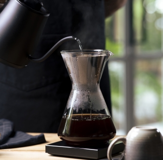 person pouring coffee