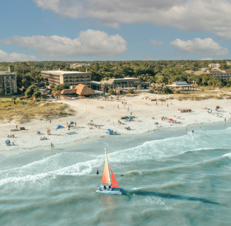 BHHHI Beach and Resort Aerial with Sailboat