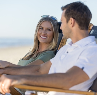 couple sitting on the beach 