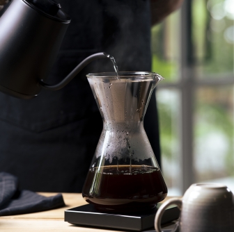 person pouring coffee