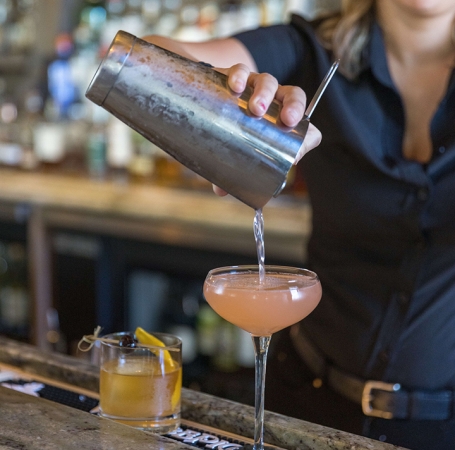 bartending pouring cocktails