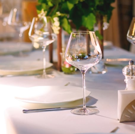 wine glass on a table setting