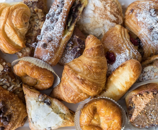 freshly made baked goods laid out on a table