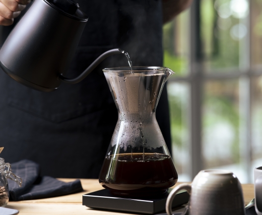 person pouring coffee