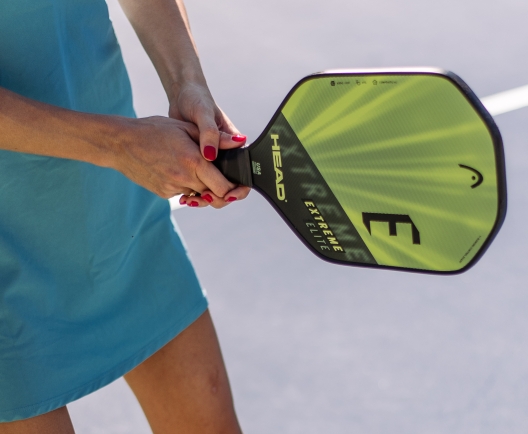 woman playing pickleball