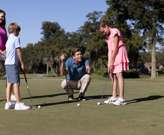 Family golfing