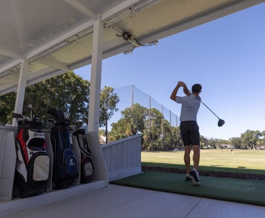 Golfer practicing swing