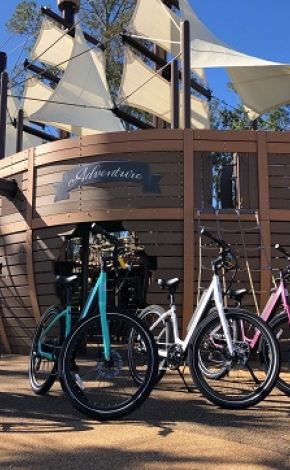 bikes in front of a ship in a playground