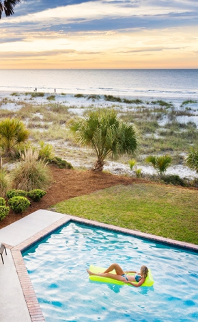 woman on a pool float in a pool