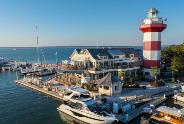 Quarterdeck venue nestled on the water near a lighthouse