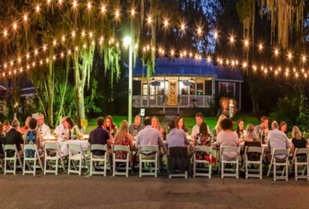 Bluffton soiree with large banquet table outside