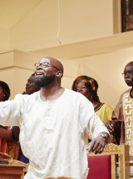 group of people singing in a choir