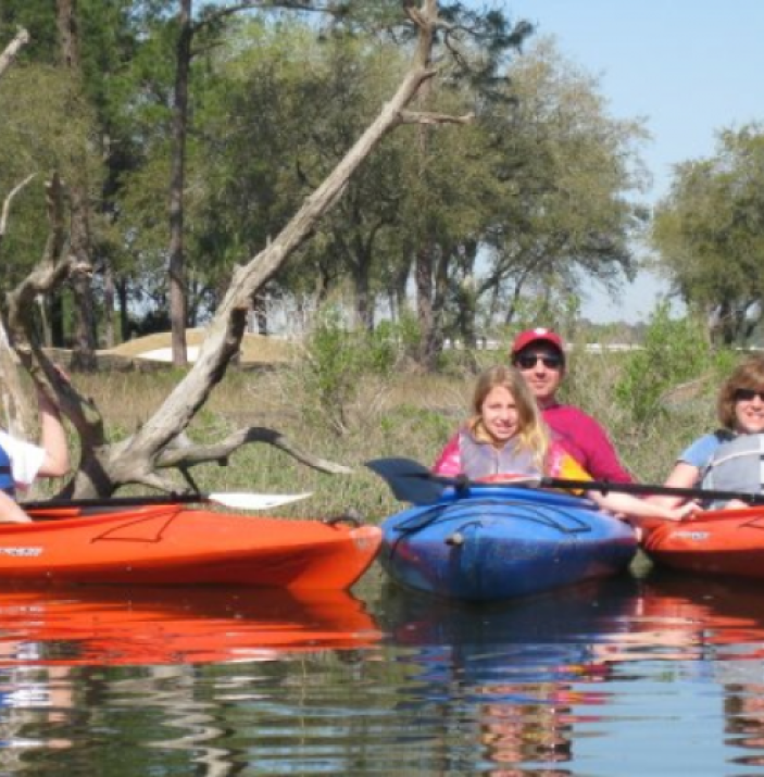 Family kayaking together