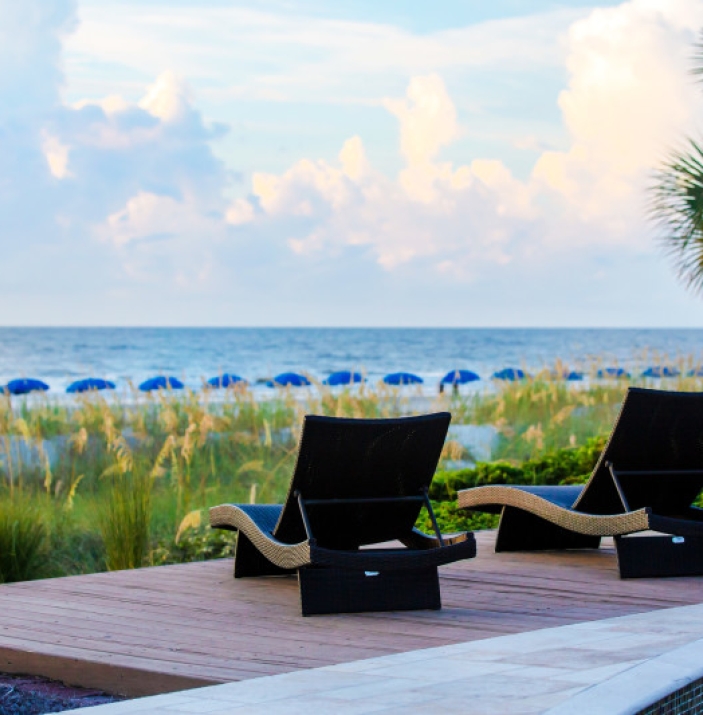 View of Armada patio with 2 lounge chairs