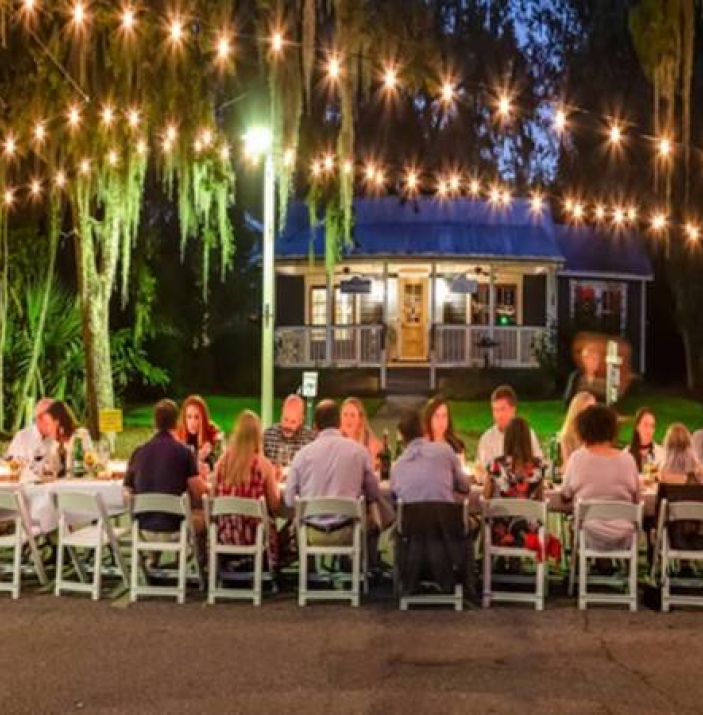 Bluffton soiree with large banquet table outside
