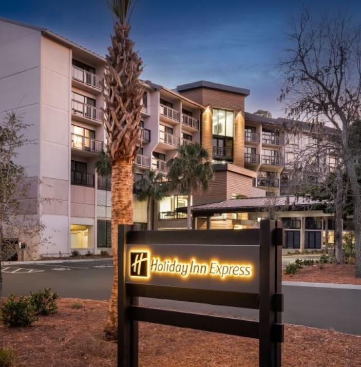 Holiday Inn Express sign lit up at night time